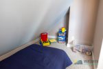 There is a closet and a kid`s nook area.